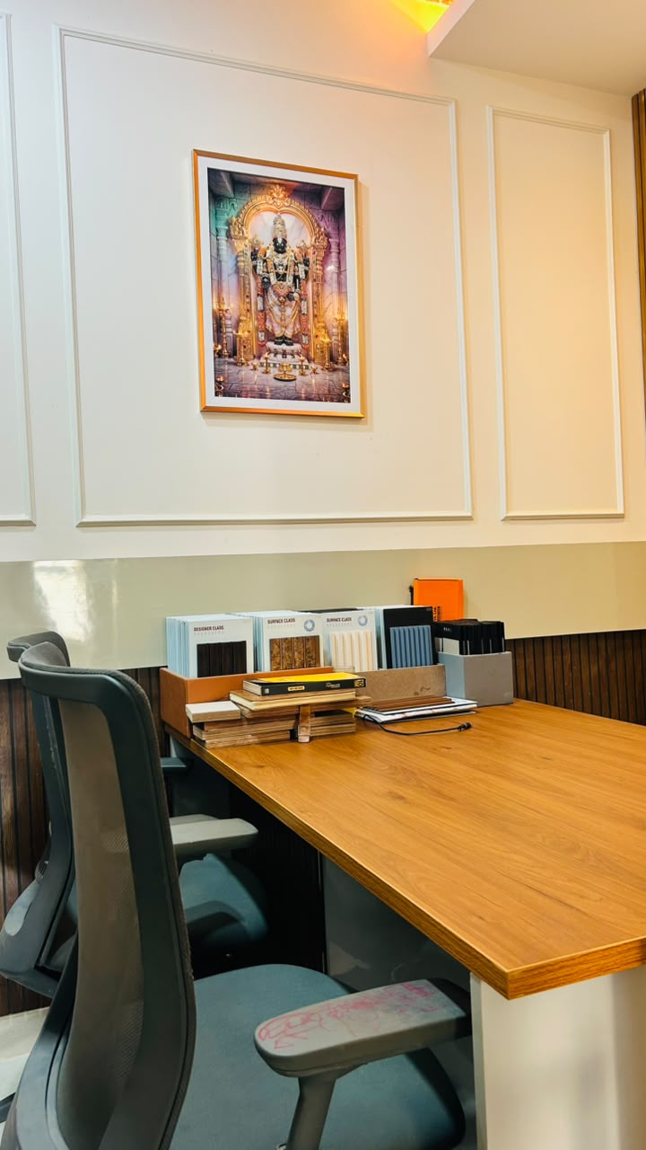 Vasvik Interiors office — design desk with material catalogues