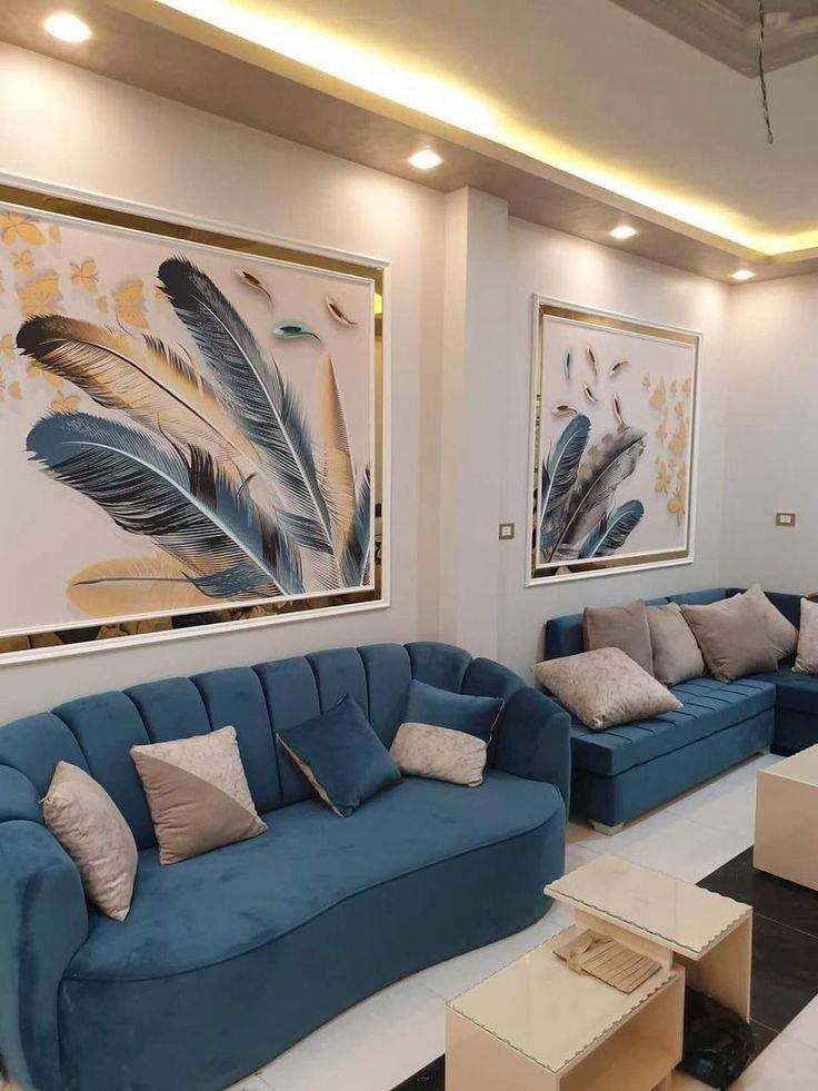 Living Room — Teal Sofas & Feather Art Panels